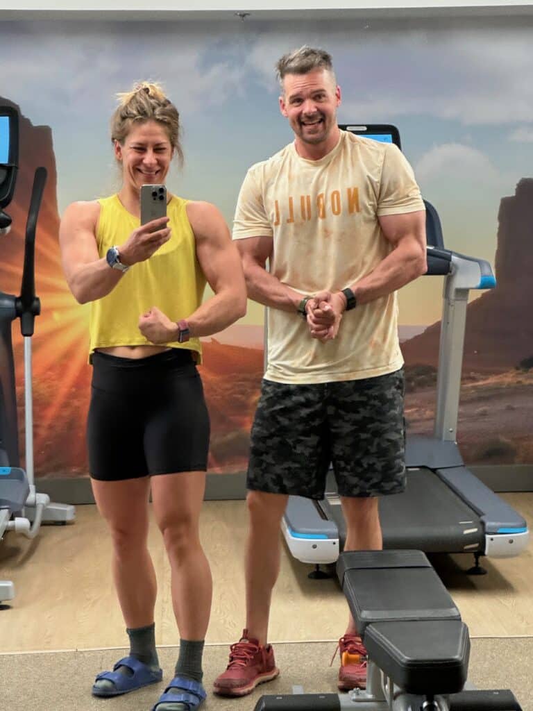 Emily and Joe flexing in hotel gym in Phoenix AZ